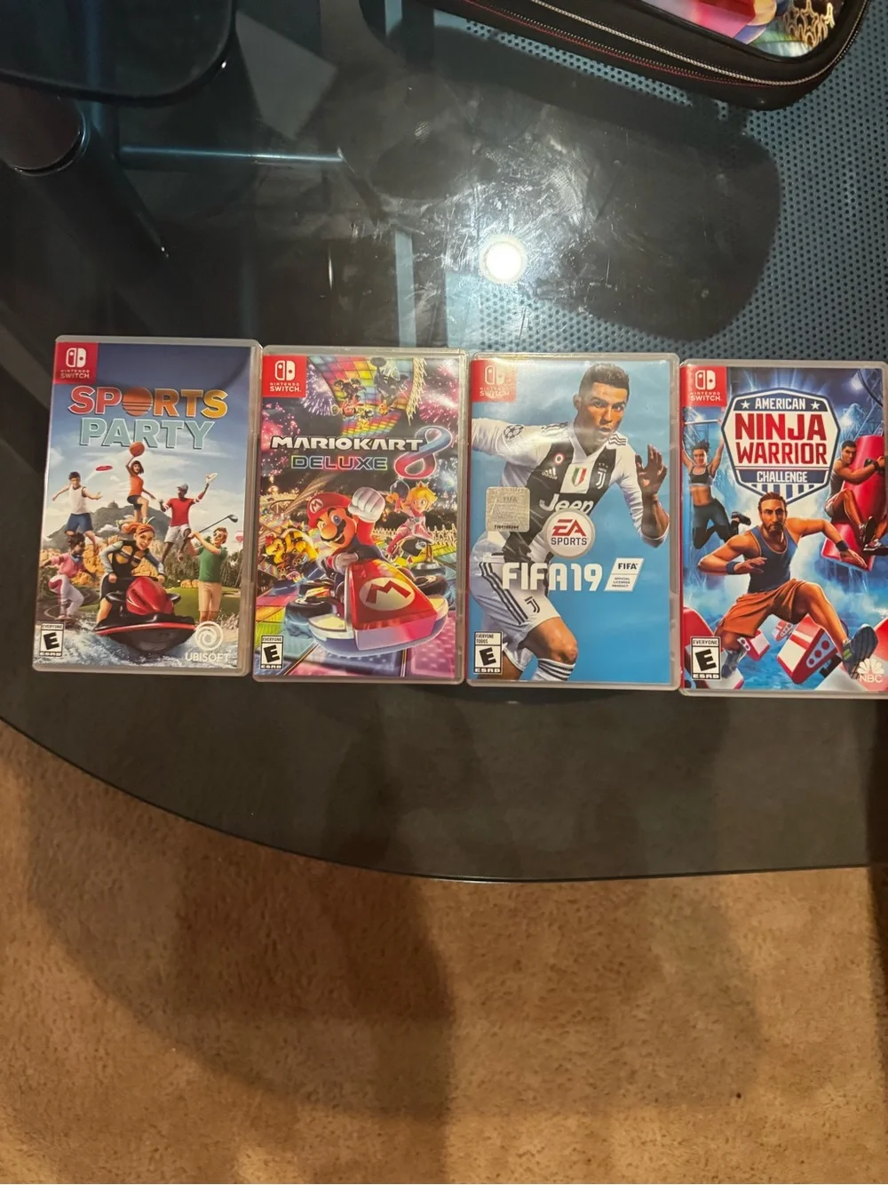 Nintendo Switch with Black Joy-Con Controllers + More